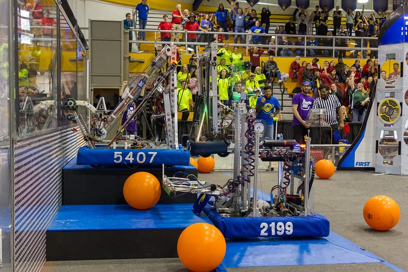 Our 2019 robot in a double climb with an alliance partner during the off-season final.